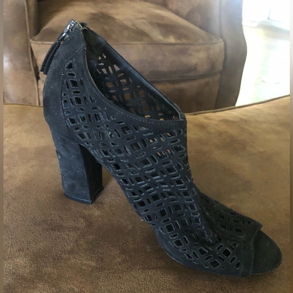 Black Suede zip up open toed shoes.